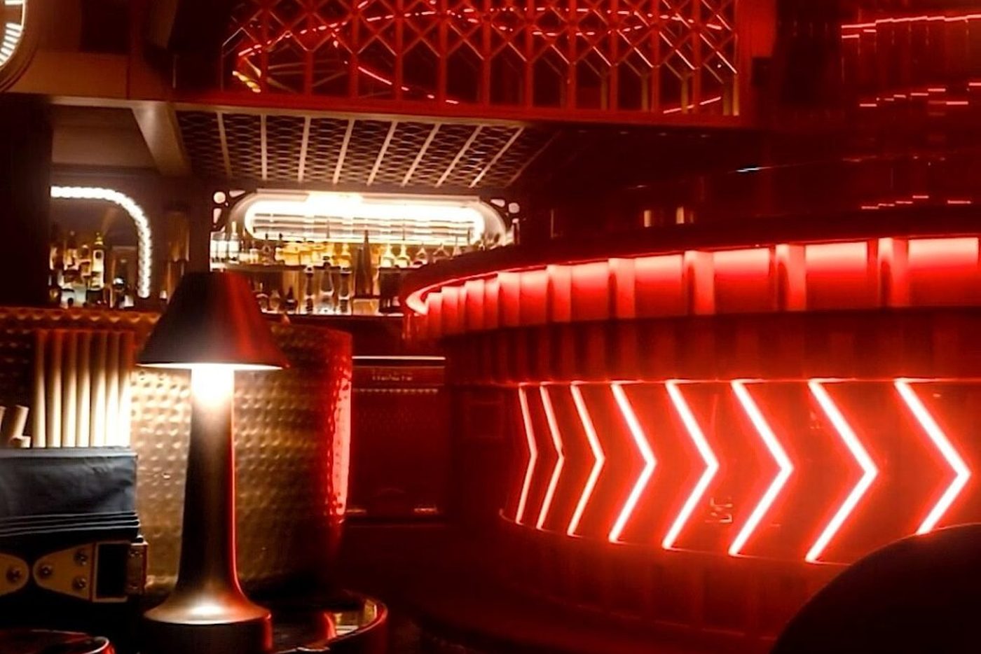 The Voyage bar under red neon